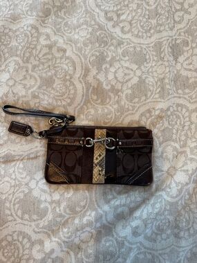 Coach Dark Brown Signature Wristlet with Snakeskin Stripe